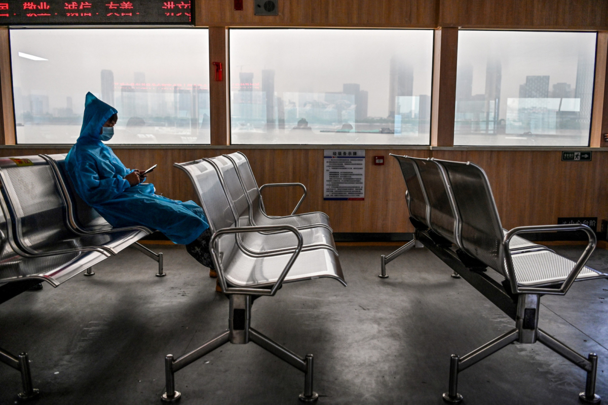 A man travels on a ferry to cross the Yangtze River in Wuhan, China, on May 14, 2020. (Hector Retamal/AFP via Getty Images)