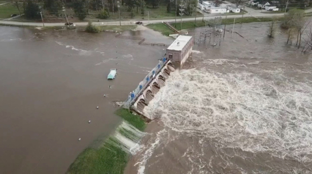 An aerial view of flooding as water overruns Sanford Dam, Michigan, on May 19, 2020. (TC Vortex/via Reuters)