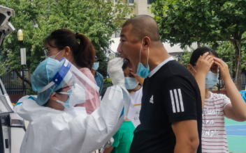 Medical Staff Across China Dispatched to Beijing as Neighborhoods, Restaurants Hit Hard by Virus