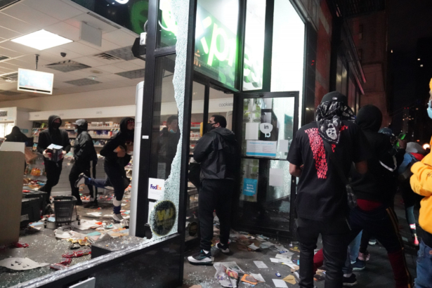 People loot a store during demonstrations