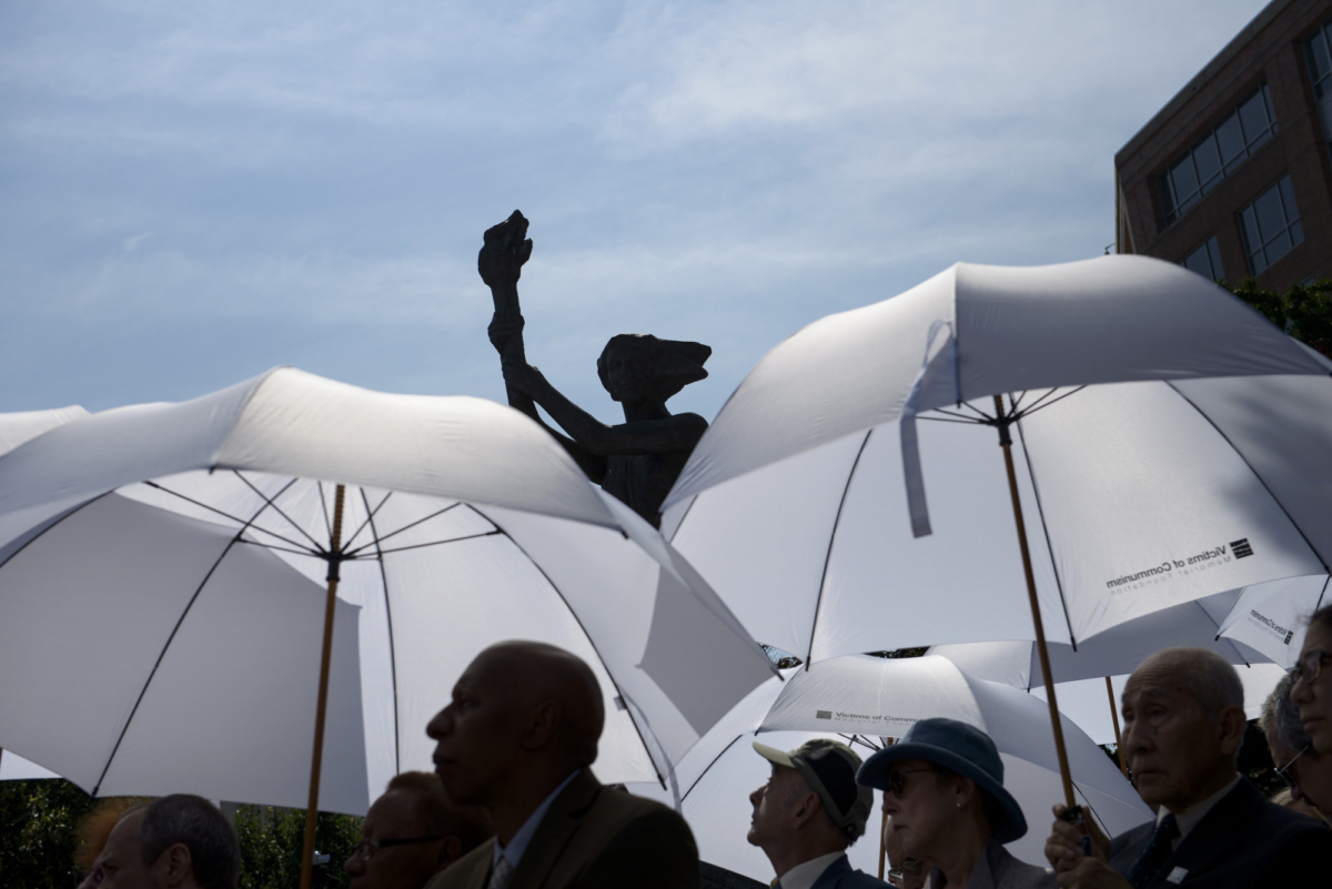 People listen during an event at the Victims of Communism Memorial in Washington on June 12, 2015. (Brendan Smialowski /AFP via Getty Images)