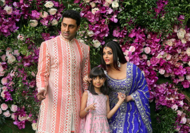 Indian film actor Abhishek Bachchan, his wife Aishwarya Rai, and their daughter Aaradhya at the wedding of Akash Ambani, the son of Reliance Industries chairman Mukesh Ambani, in Mumbai, India, on March 9, 2019. (Francis Mascarenhas/Reuters)