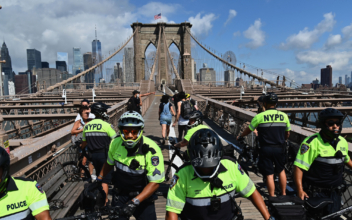 Dozens of Protesters Arrested, 3 NYPD Officers Injured Following Clashes on Brooklyn Bridge