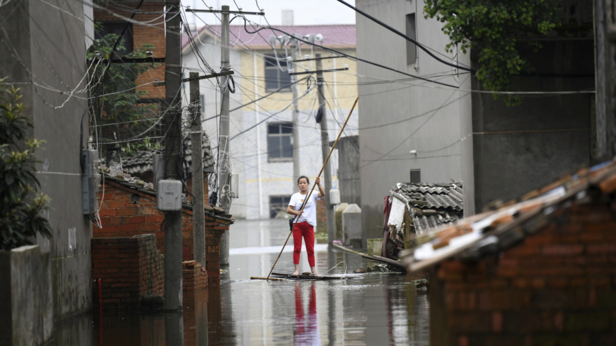 Red Alerts in China as Floods Maroon Equipment Needed to Fight Virus