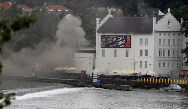 Smokes rises from a technical building of the Kampa Museum in Prague, Czech Republic, on July 15, 2020. (Petr David Josek/AP Photo)