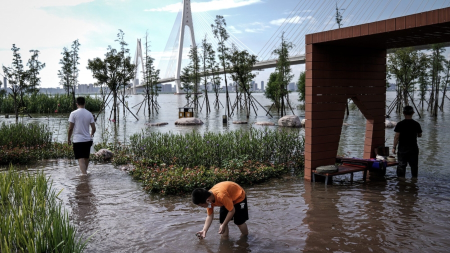 Chinese Media Glorifies Flood Disaster