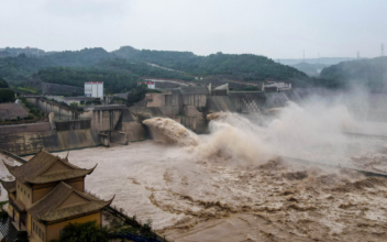 Soldiers Blast Dam in China Breached by Rain
