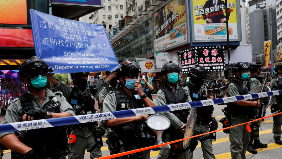 Hong Kong Police Make First 2 Arrests Under National Security Law