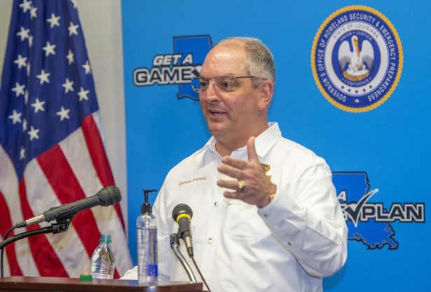 Louisiana Gov. John Bel Edwards answers questions while holding a media briefing about the state's activity related to Hurricanes Marco and Laura in Baton Rouge, La., on August 24, 2020. (Bill Feig./The Advocate via AP)