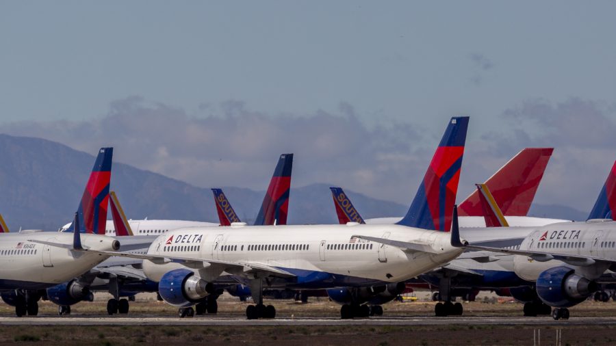Passenger Arrested on Delta Flight After Cutting Himself and a Flight Attendant, Authorities Say