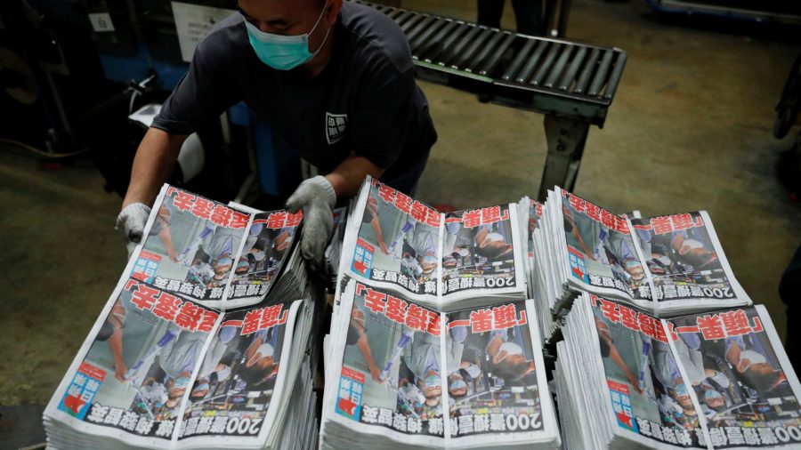 Hong Kong’s Apple Daily Vows to Fight On After Owner Arrested