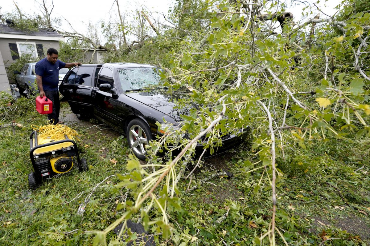 Reginald Duhon prepares to work at his home in Lake Charles, La., on Aug. 27, 2020, after Hurricane Laura moved through the state. (Gerald Herbert/AP Photo)