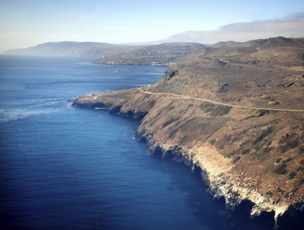 An aerial view of the coast and Pacific Ocean taken flying in to San Clemente Island, in San Diego, on July 16, 2013. (Mindy Schauer/The Orange County Register via AP)