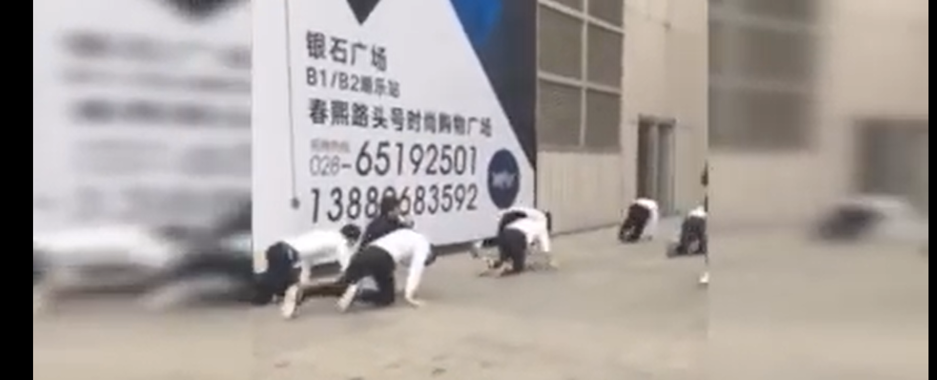 Employees Crawl in Public as Punishment