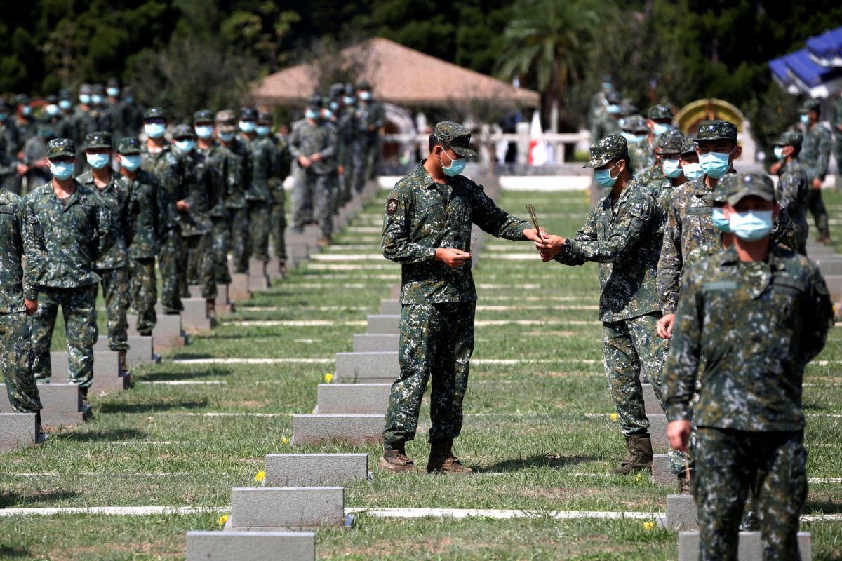 Soldiers pass incense