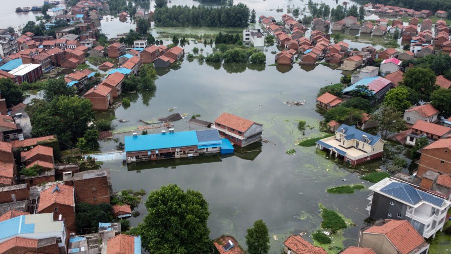 Chinese Cities Bracing for Next Round of Floods After Heavy Rains, Flooding