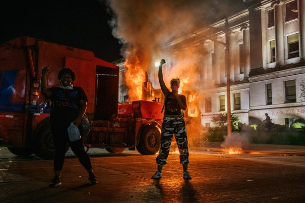 Demonstrators chant