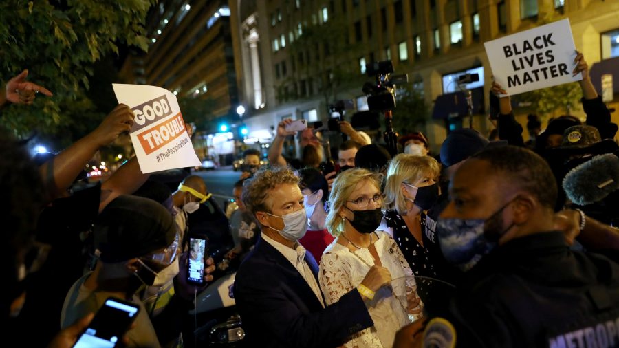 Demonstrators in Washington Surround Sen. Rand Paul, Assault Elderly Man