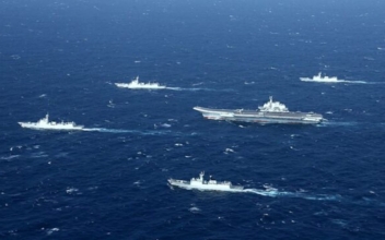 Chinese Navy Chases Civilian Ship in South China Sea