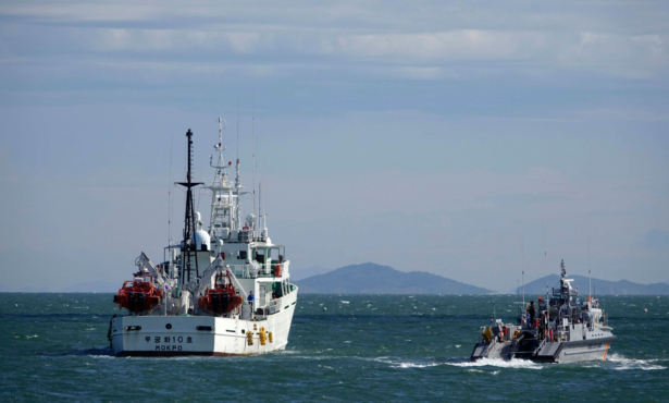 South Korea's government ships are seen near Yeonpyeong island, South Korea, on Sept. 25, 2020. (Baek Seung-ryul/Yonhap via AP)