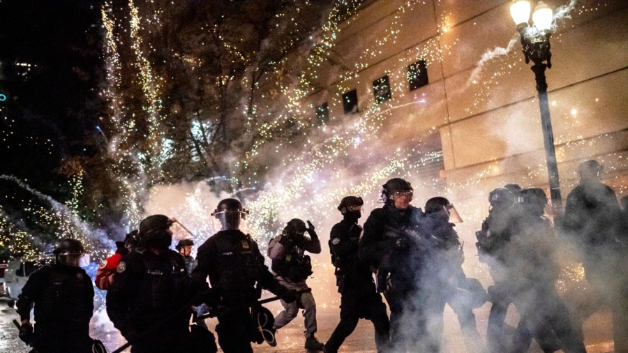 14 Arrested Amid Rioting in Portland; Crowd Dispersed in Seattle
