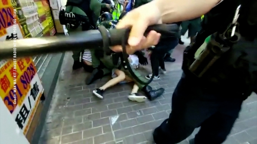 Hong Kong Police Under Fire for Violent Arrest