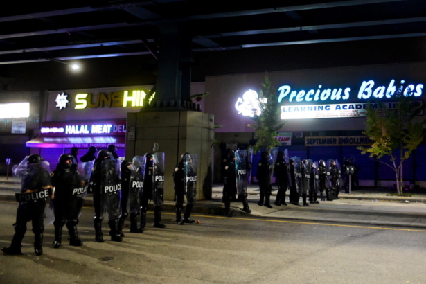 Police officers line up as demonstrators take part in rally in Philadelphia, Penn., on Oct. 27, 2020. (Bastiaan Slabbers/Reuters)