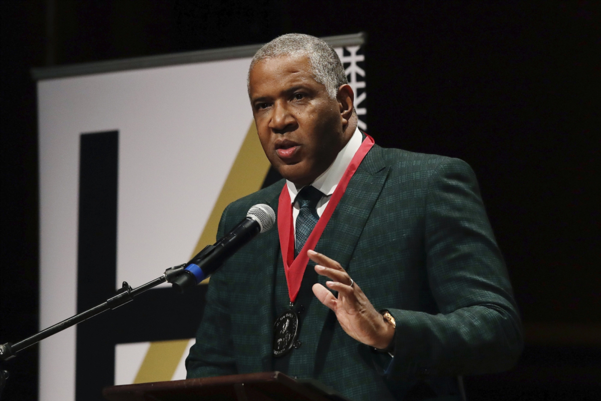 Billionaire businessman Robert F. Smith speaks after receiving the W.E.B. Dubois Medal for contributions to black history and culture, during ceremonies at Harvard University in Cambridge, Mass., on Oct. 22, 2019. (AP Photo/Elise Amendola)