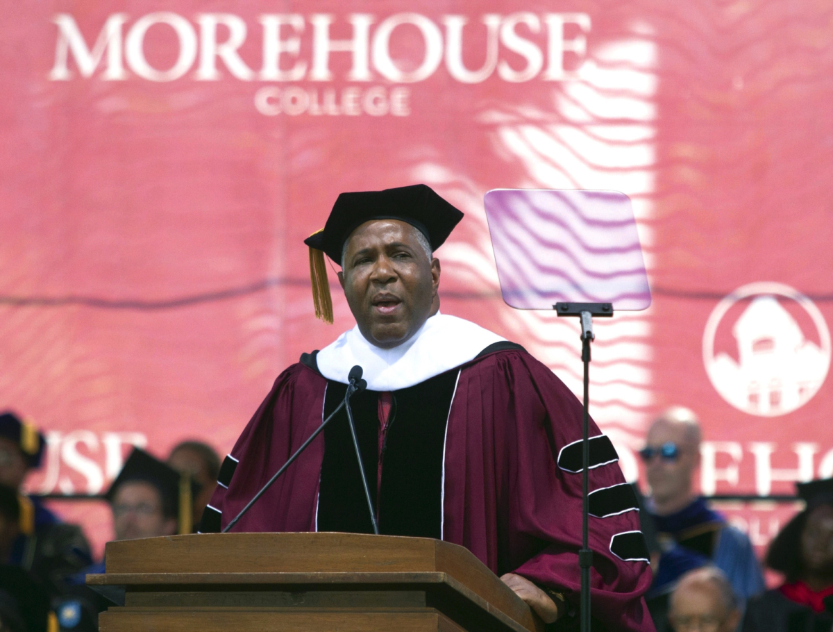 Billionaire technology investor and philanthropist Robert F. Smith announces he will provide grants to wipe out the student debt of the entire 2019 graduating class at Morehouse College in Atlanta on May 19, 2019. (Steve Schaefer/Atlanta Journal-Constitution via AP)