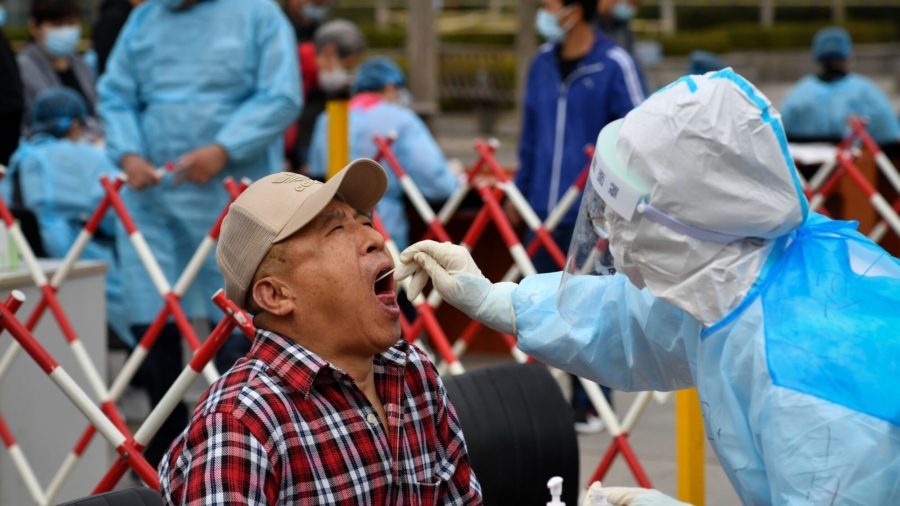 China’s Mass Virus Testing Results Face Scrutiny