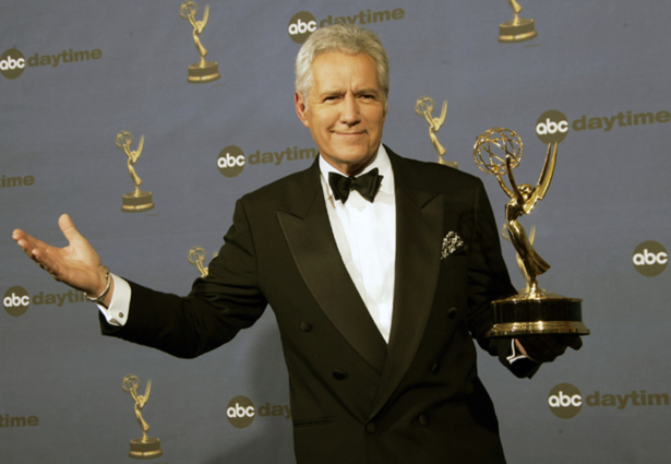 Alex Trebek holds the award for outstanding game show host, for his work on "Jeopardy!" backstage at the 33rd Annual Daytime Emmy Awards in Los Angeles, Calif., on April 28, 2006. (Reed Saxon/AP Photo)