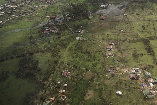 In this aerial photo provided by the Philippine Coast Guard, damaged homes are seen at Catanduanes province, eastern Philippines on Nov. 2, 2020. (Philippine Coast Guard via AP)
