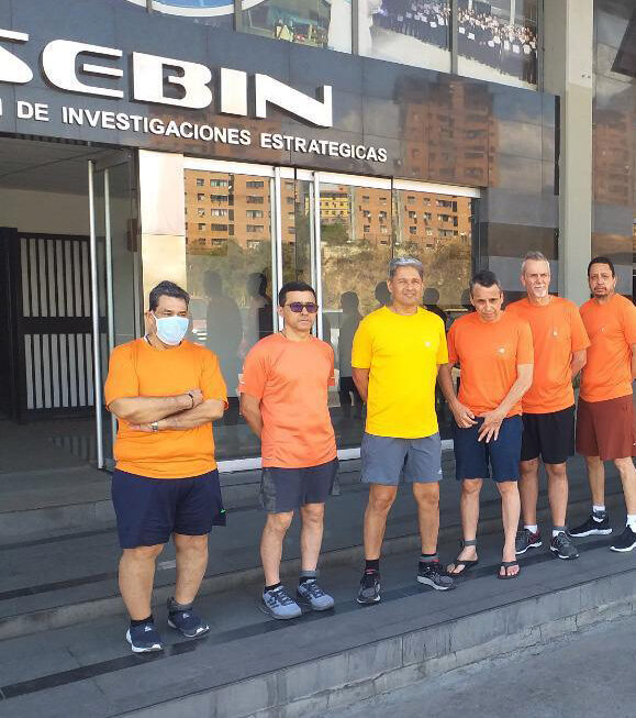 This undated file photo posted on Twitter on June 18, 2020 by Venezuela's Foreign Minister Jorge Arreaza, shows CITGO oil executives Jose Angel Pereira, from (L-R) Gustavo Cardenas, Jorge Toledo, Jose Luis Zambrano, Tomeu Vadell, and Alirio Jose Zambrano, standing outside the Bolivarian National Intelligence Service, in Caracas, Venezuela. (Posted on Twitter by Jorge Arreaza/Venezuela's Foreign Ministry via AP File)