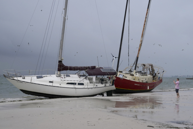 Boats sit on the beach in the aftermath of Tropical Storm Eta, in Gulfport, Fla., on Nov. 12, 2020. (Lynne Sladky/AP Photo)