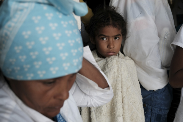 People rest in a makeshift shelter after Hurricane Eta made landfall, in Wawa, Nicaragua, on Nov. 3, 2020. (Carlos Herrera/AP Photo)
