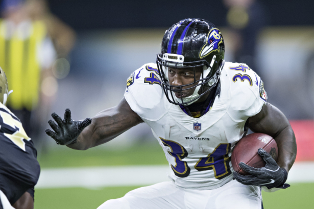 Lorenzo Taliaferro of the Baltimore Ravens runs the ball during a preseason game against the New Orleans Saints at Mercedes-Benz Superdome in New Orleans, Louisiana, on Aug. 31, 2017. (Wesley Hitt/Getty Images)