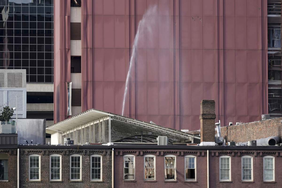 Windows are blown out and a broken water pipe sprays in a building near the scene of an explosion in downtown Nashville, Tenn., on Dec. 25, 2020. (Mark Humphrey/AP Photo)
