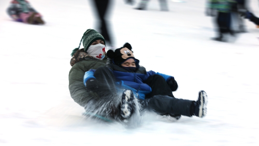 New Yorkers Frolic in Snow