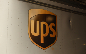 UPS Driver Dies After Assault; Search Underway for Suspect