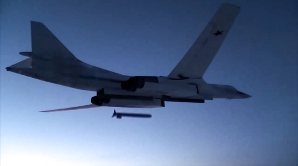 A Russian Tu-160 strategic bomber fires a cruise missile at test targets, during a military drill, Russia, on Dec. 9, 2020. (Russian Defense Ministry Press Service via AP)