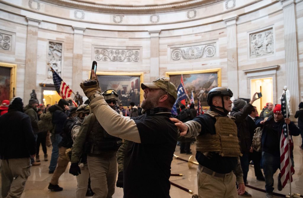 Protesters are seen taking pictures inside the U.S. Capitol, in Washington, on Jan. 6, 2021. (Saul Loeb/AFP via Getty Images)