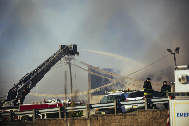 Firefighters battle a blaze in an industrial area in Passaic, NJ, on Saturday, Jan. 30, 2021. (Kevin Hagen/AP)