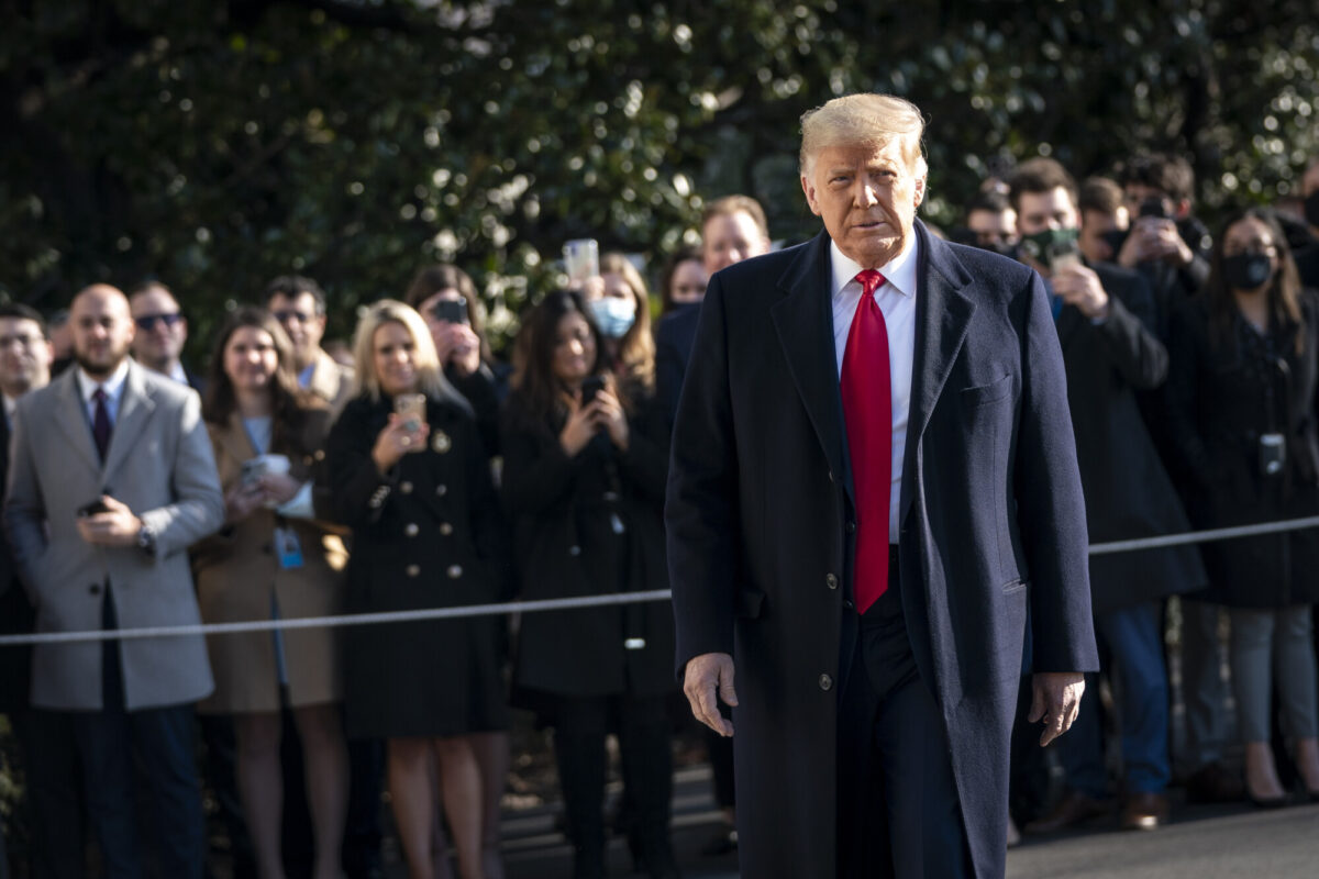 U.S. President Donald Trump turns to reporters as he exits the White House to walk toward Marine One on the South Lawn on January 12, 2021 in Washington, DC. (Drew Angerer/Getty Images)