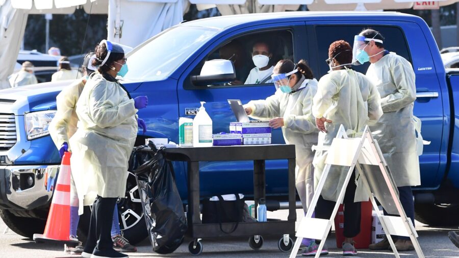 Firms Offer Workers Bonuses to Get Vaccine