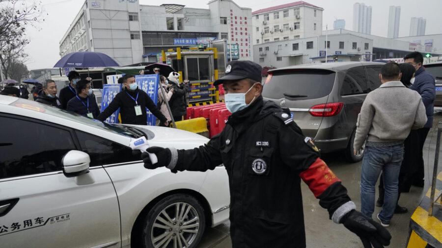 WHO Teams Visits Wuhan Food Market in Search of Virus Clues