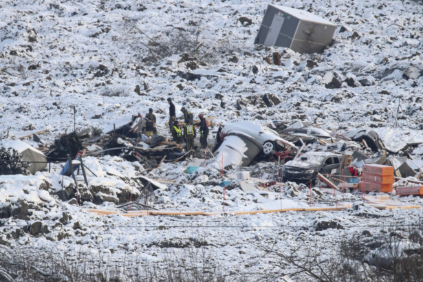 Rescue workers continue after the large landslide that destroyed several houses at Ask, Norway, on Jan 5, 2021. (Terje Pedersen/NTB via AP)