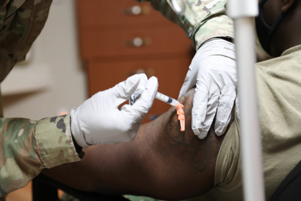 A member of the military is injected with Moderna's COVID-19 vaccine in Pyeongtaek, South Korea on Dec. 29, 2020. (United States Forces Korea via Getty Images)