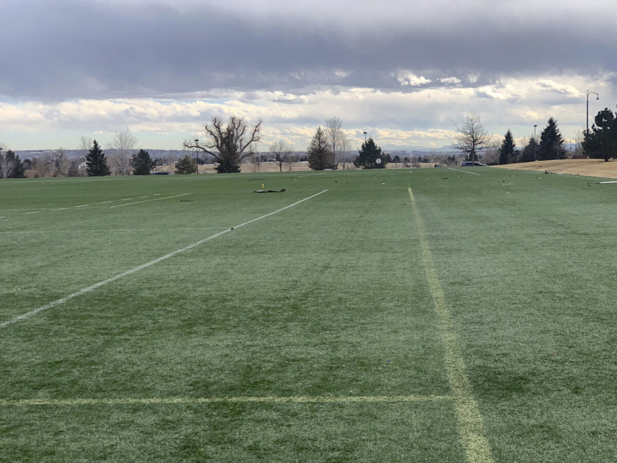 Debris is scattered across a turf field at Commons Park, in Broomfield, Colo., on Feb. 20, 2021.<br/>(Broomfield Police Department via AP)