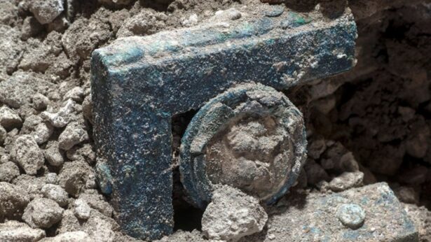 An ancient-Roman ceremonial carriage is discovered in a dig near the ancient Roman city of Pompeii, destroyed in 79 AD in volcanic eruption, in Italy on Feb. 2021. (Luigi Spina, Pompeii Archeological Park/Ministry of Cultural Heritage and Activities and Tourism, Handout via Reuters)