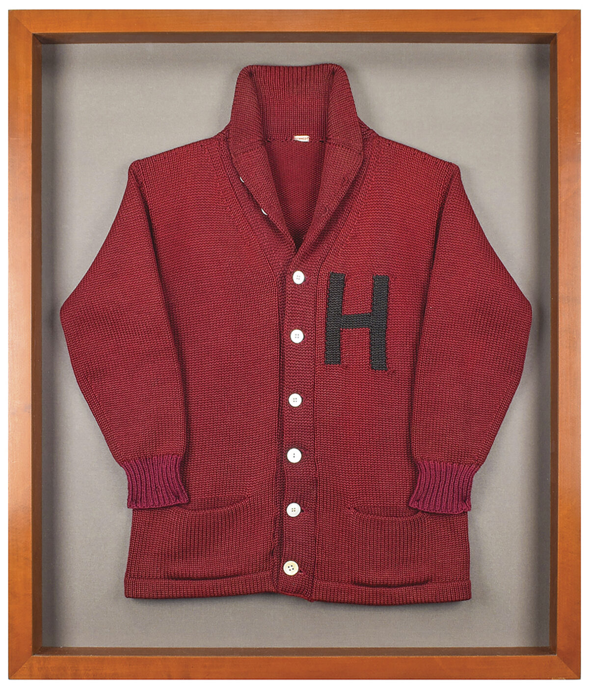 A Harvard University letter sweater that once belonged to former President John F. Kennedy, up for auction between Feb. 11-18, 2021, by the Boston-based auction firm. (Nikki Brickett/RR Auction via AP)